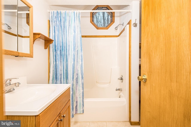 bathroom featuring tile patterned floors, vanity, and shower / bath combination with curtain