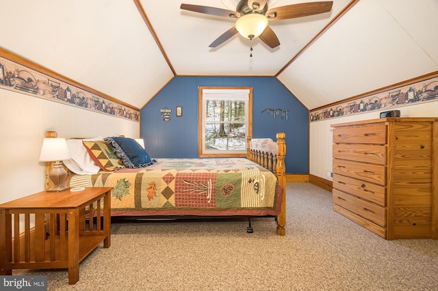 bedroom with ceiling fan, lofted ceiling, and carpet floors