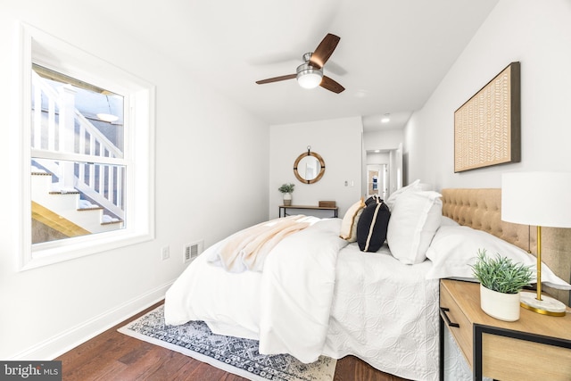 bedroom featuring ceiling fan and wood-type flooring