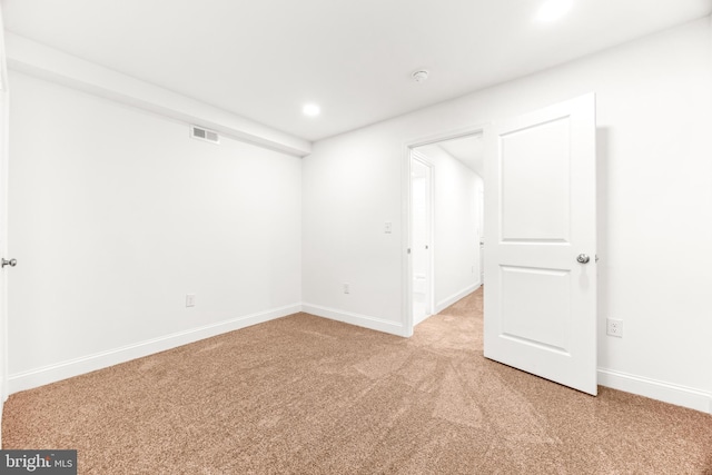 unfurnished room with carpet flooring