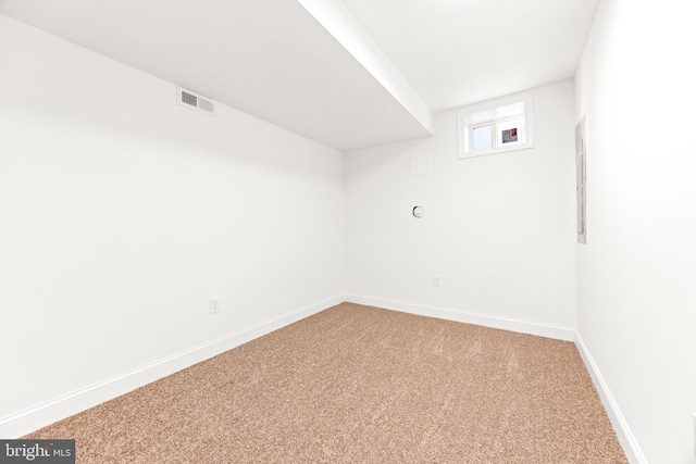 unfurnished room featuring carpet flooring