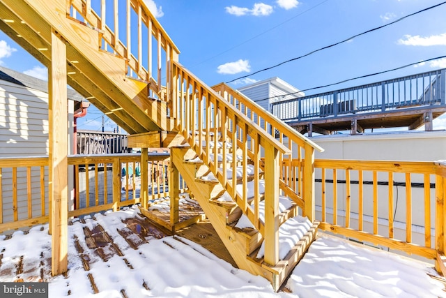 view of snow covered deck