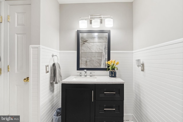 bathroom featuring vanity and walk in shower