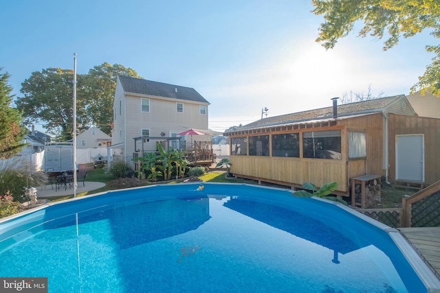 view of pool with a deck