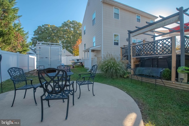 view of patio with a pergola and a hot tub