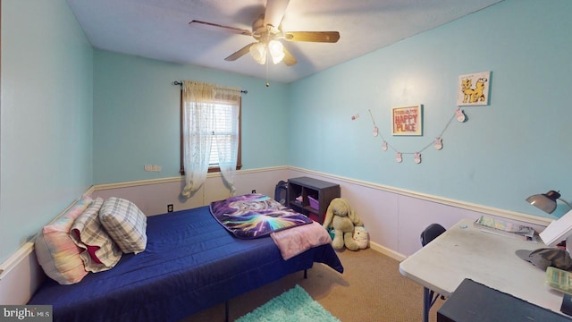 bedroom featuring carpet and ceiling fan