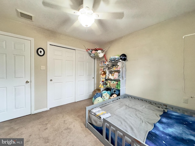 bedroom with carpet flooring and ceiling fan