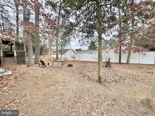 view of yard featuring a sunroom