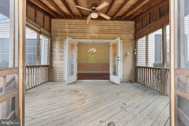 wooden deck featuring ceiling fan