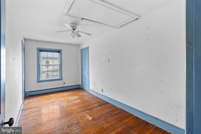 empty room with ceiling fan, light hardwood / wood-style flooring, and a baseboard radiator