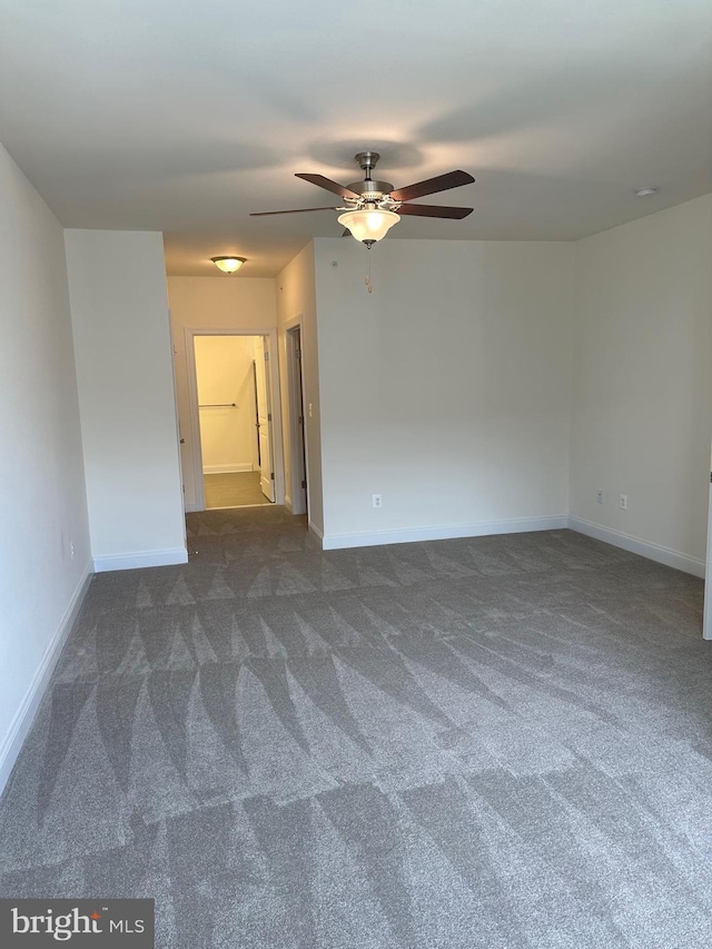 carpeted empty room with ceiling fan