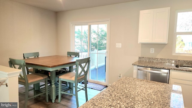 dining room featuring dark hardwood / wood-style flooring