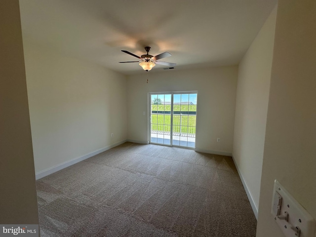 empty room with light carpet and ceiling fan