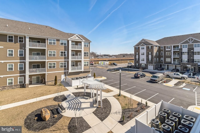 view of home's community with a pergola