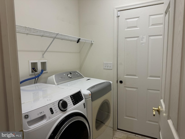 laundry room featuring washer and dryer