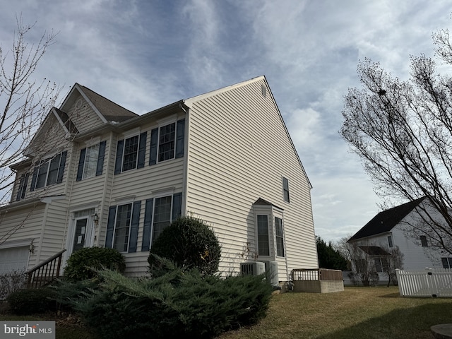 view of home's exterior featuring central AC