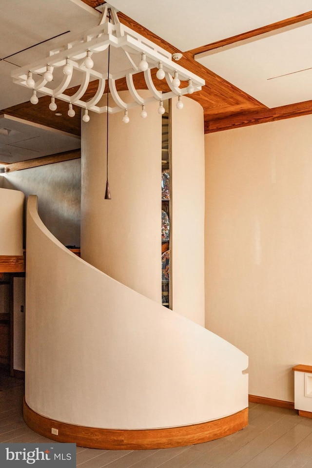 stairway with hardwood / wood-style flooring