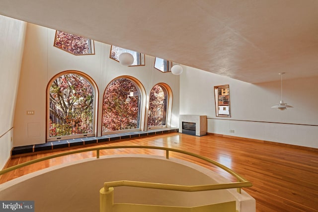 game room with ceiling fan and hardwood / wood-style flooring