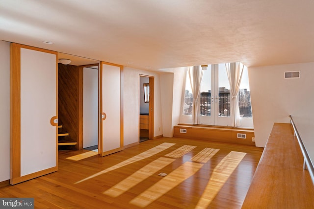 interior space with hardwood / wood-style flooring