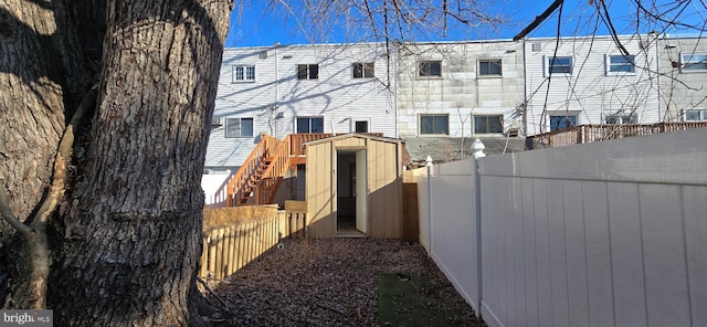 exterior space with a storage shed