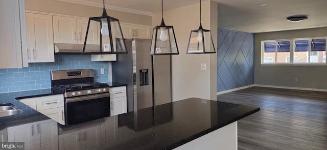 kitchen with dark wood-type flooring, crown molding, hanging light fixtures, white cabinetry, and stainless steel appliances