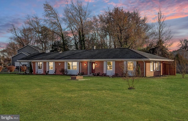 view of front of house with a lawn