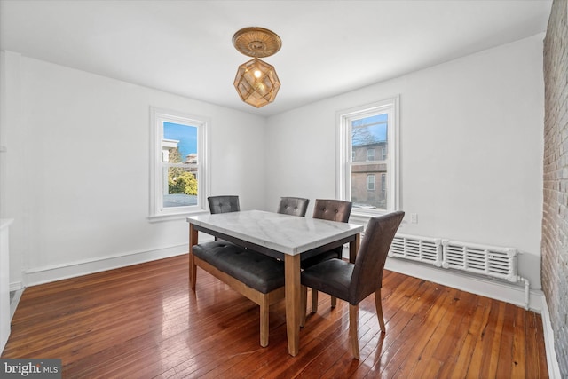 dining room featuring dark wood-type flooring