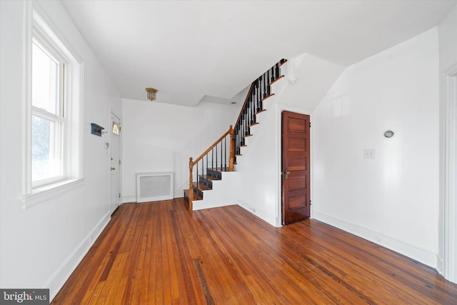 entrance foyer featuring hardwood / wood-style floors