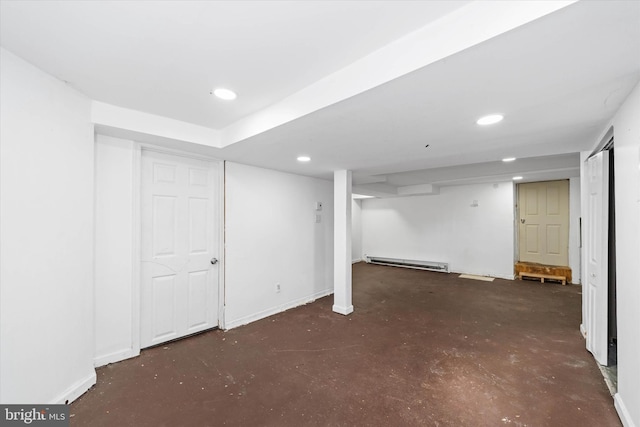 basement featuring a baseboard heating unit