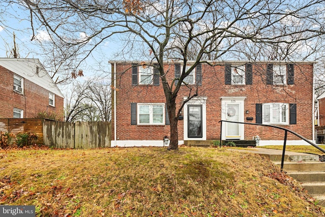 view of front facade with a front lawn