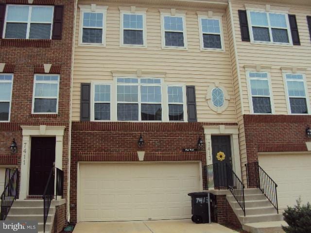 view of property with a garage