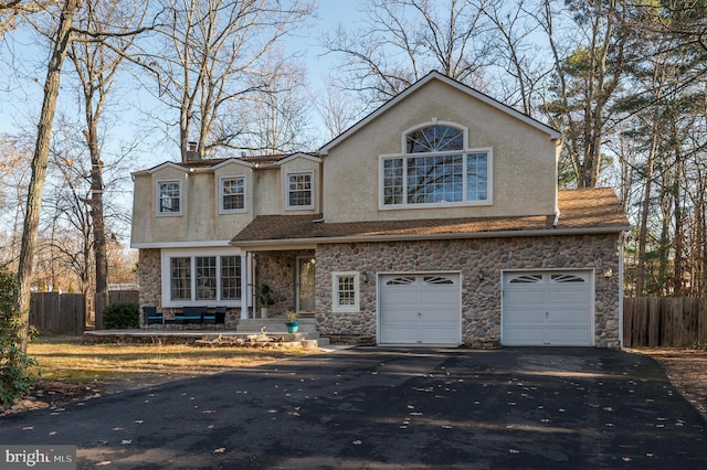 view of front of property featuring a garage