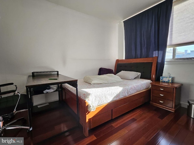 bedroom featuring dark hardwood / wood-style floors