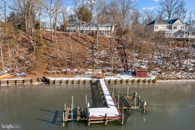 dock area featuring a water view