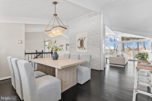 dining area featuring vaulted ceiling with beams, a notable chandelier, and dark hardwood / wood-style flooring