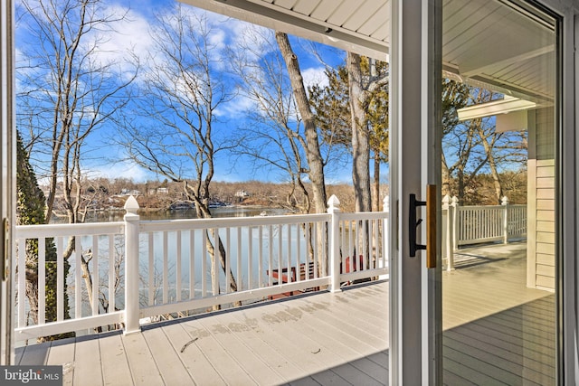 deck featuring a water view