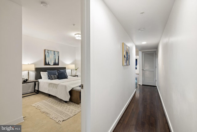 bedroom featuring hardwood / wood-style floors