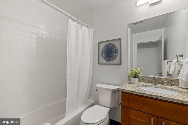 full bathroom with vanity, toilet, and shower / bath combo with shower curtain