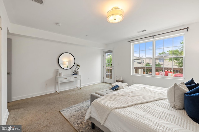 bedroom with light carpet