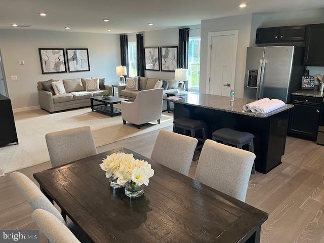 dining room featuring light hardwood / wood-style flooring