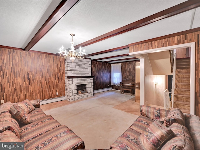 living room featuring beamed ceiling, wood walls, a stone fireplace, and a baseboard heating unit