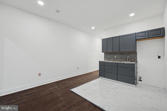 2808 Germantown Ave, Philadelphia, PA 19133 - kitchen featuring recessed lighting, backsplash, dark wood-type flooring, gray cabinets, and light stone countertops