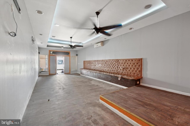 2808 Germantown Ave, Philadelphia, PA 19133 - unfurnished living room featuring ceiling fan, wood finished floors, and a wall unit AC