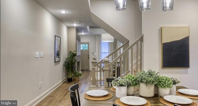 dining room with hardwood / wood-style flooring