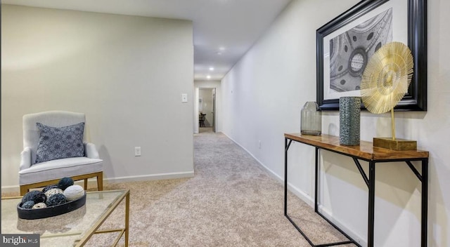 hallway with light carpet