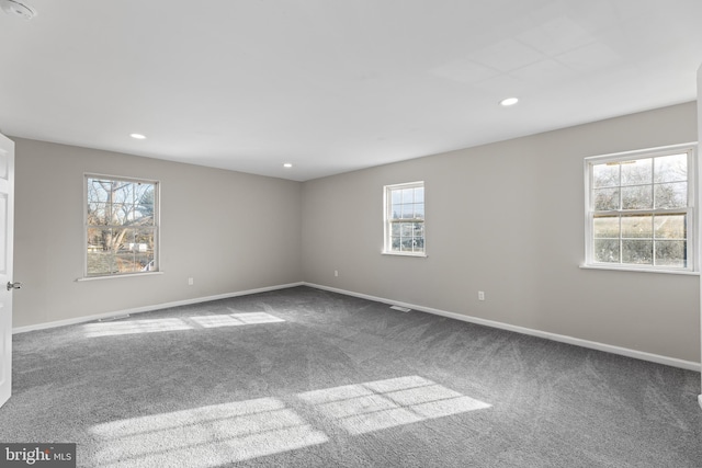 view of carpeted spare room