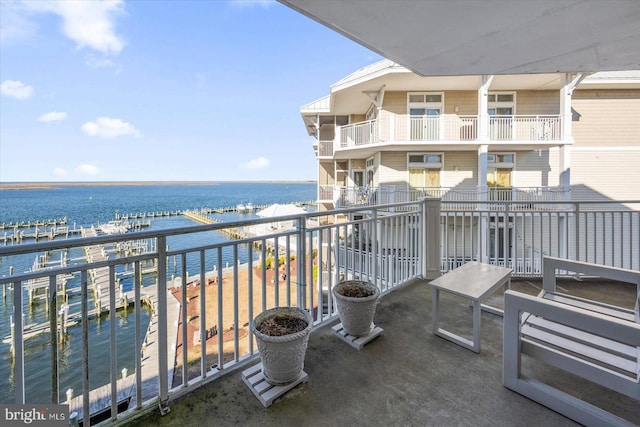 balcony featuring a water view