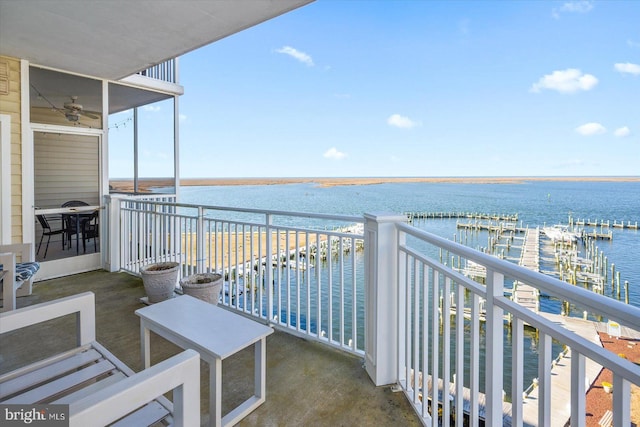 balcony featuring a water view