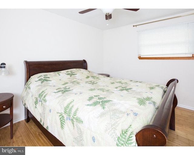 bedroom featuring ceiling fan and light wood-type flooring