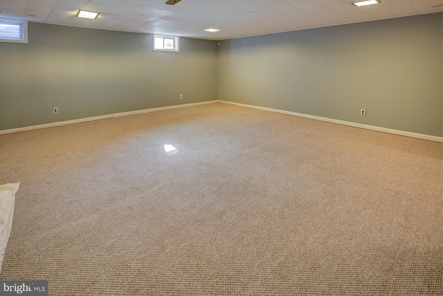 basement with light colored carpet